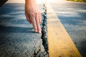 Cracked asphalt road surface